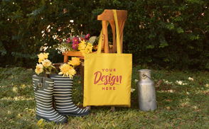 Tote bag on chair with flowers mockup