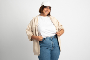 Plus size woman with jacket showcasing a t-shirt mockup