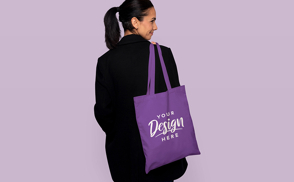 Woman in blazer and tote bag mockup