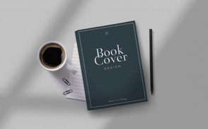 Book with coffee cup and pencil mockup