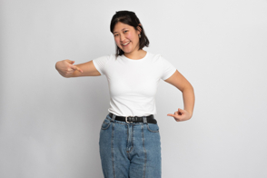 Asian girl pointing her t-shirt mockup