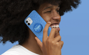 Model holding phone case and popsocket mockup