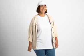 Plus size girl with cap and t-shirt mockup