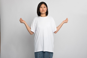 Asian woman with earrings in t-shirt mockup