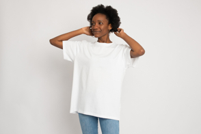 Black female with earrings in t-shirt mockup