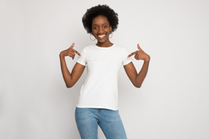 Black female pointing her t-shirt mockup