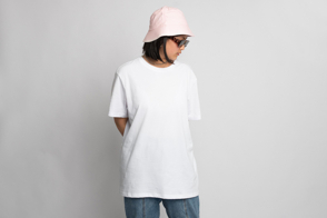 Asian woman with pink hat and t-shirt mockup