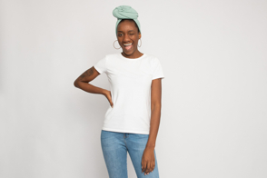 Black woman with hand on waist in t-shirt mockup