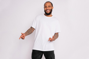 Black tattooed man using a t-shirt mockup