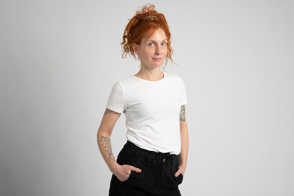 Redhead woman with tattoos in t-shirt mockup