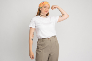 Strong hispanic woman with bandana in t-shirt mockup