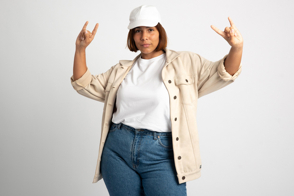 Plus size girl doing gestures in t-shirt mockup