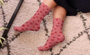 Heart shaped socks on feet mockup