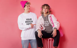 Couple with sweatshirts mockup.