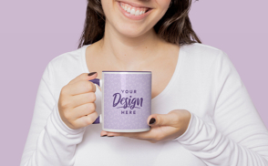 Woman smiling with ceramic mug mockup