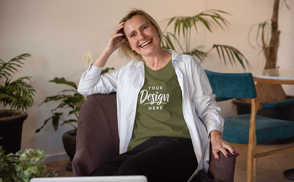 Blonde woman laughing on couch t-shirt mockup