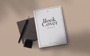 Closed book with ink and pen mockup
