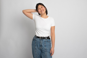 Joyful asian woman in t-shirt mockup