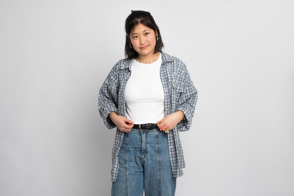 Asian female with checkered shirt and t-shirt mockup