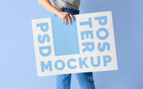 model holding poster mockup-repeated