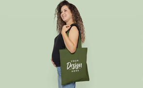 Happy pregnant woman with tote bag mockup