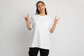 Latin american woman doing rocker gestures in t-shirt mockup
