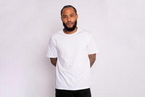 Young black man wearing a t-shirt mockup