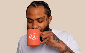 Tattooed man drinking in mug mockup | Edit Online & Download