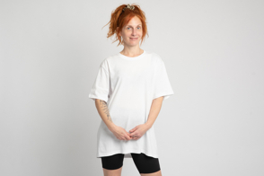 Redhead adult woman with earrings in t-shirt mockup