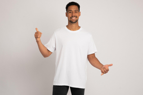 Hispanic male model doing hand gestures in t-shirt mockup