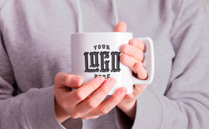 hands holding mug mockup