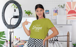 Woman filming with t-shirt mockup