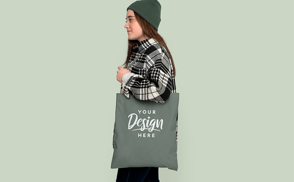 Teen girl with flannel and tote bag mockup