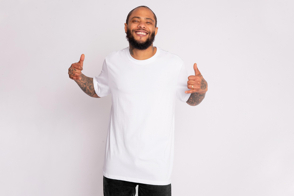 Smiling black man wearing a t-shirt mockup