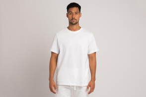 Hispanic man wearing white pants and t-shirt mockup