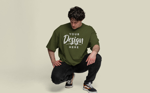 Man kneeling oversized t-shirt mockup | Start Editing Online