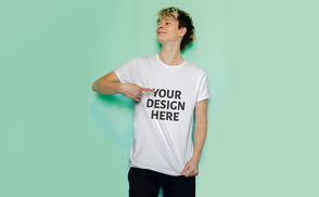 Blonde man smiling and pointing to t-shirt mockup