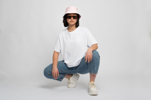 Asian woman with cool hat and t-shirt mockup