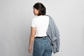 Asian female backwards with checkered shirt and t-shirt mockup