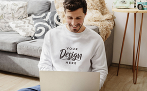 Male model with laptop sweatshirt mockup