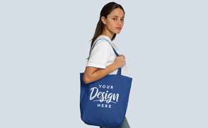 Brunette girl in jeans tote bag mockup | Start Editing Online