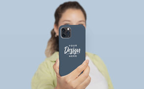 Woman with ponytail holding phone case mockup