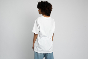 Black woman with afro backwards in t-shirt mockup