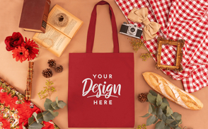 Tote bag on table with cottagecore elements mockup