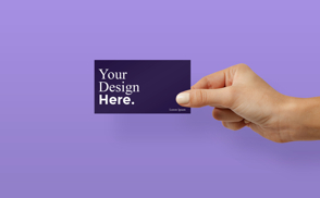 Hand holding business card mockup