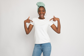 Smiling black woman modelling a t-shirt mockup
