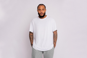 Handsome black man using a t-shirt mockup