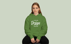 Cool girl sitting wearing a hoodie mockup | Start Editing Online