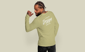 Man showing muscles long sleeve mockup | Start Editing Online