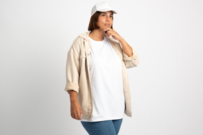 Plus size woman with thoughtful expression in t-shirt mockup